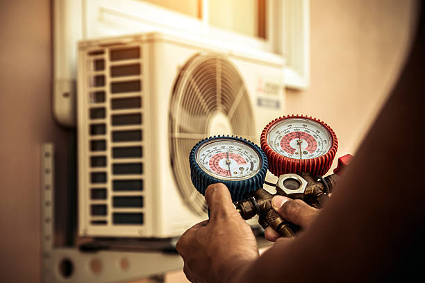 Professional Hvac technician working in Baldwin Place, NY